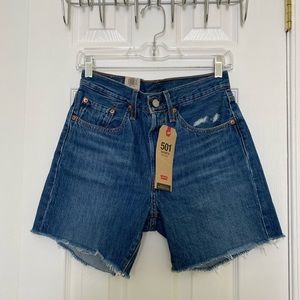 Blue women’s mid thigh levi jean shorts